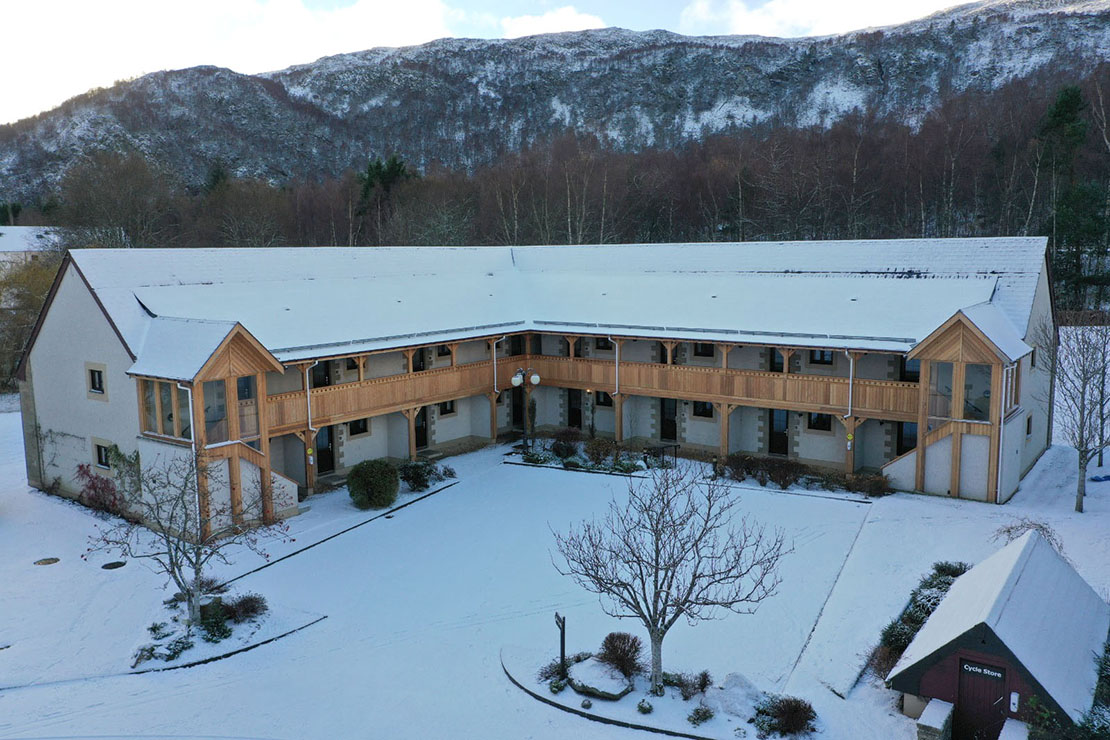 Scandinavian Village apartments in the snow