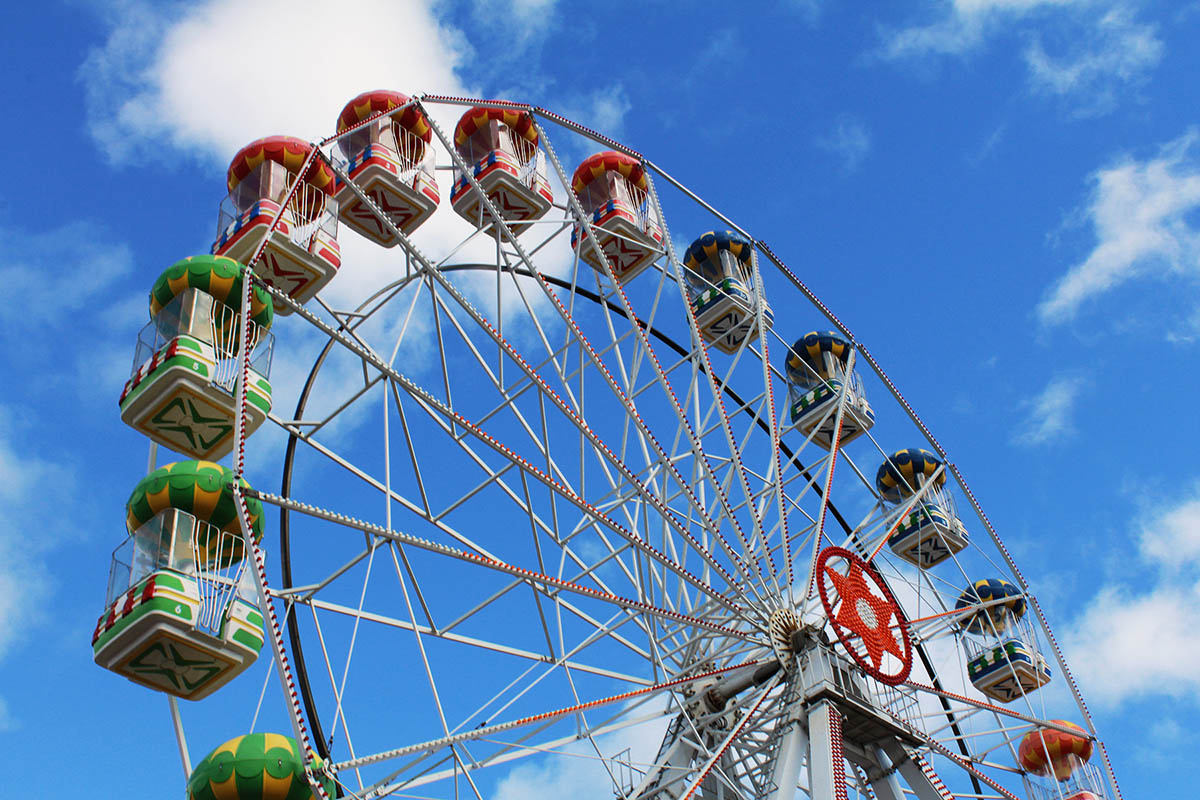 The colourful Grampian Eye ferris wheel at Codona's Amusement Park, Aberdeen Beach