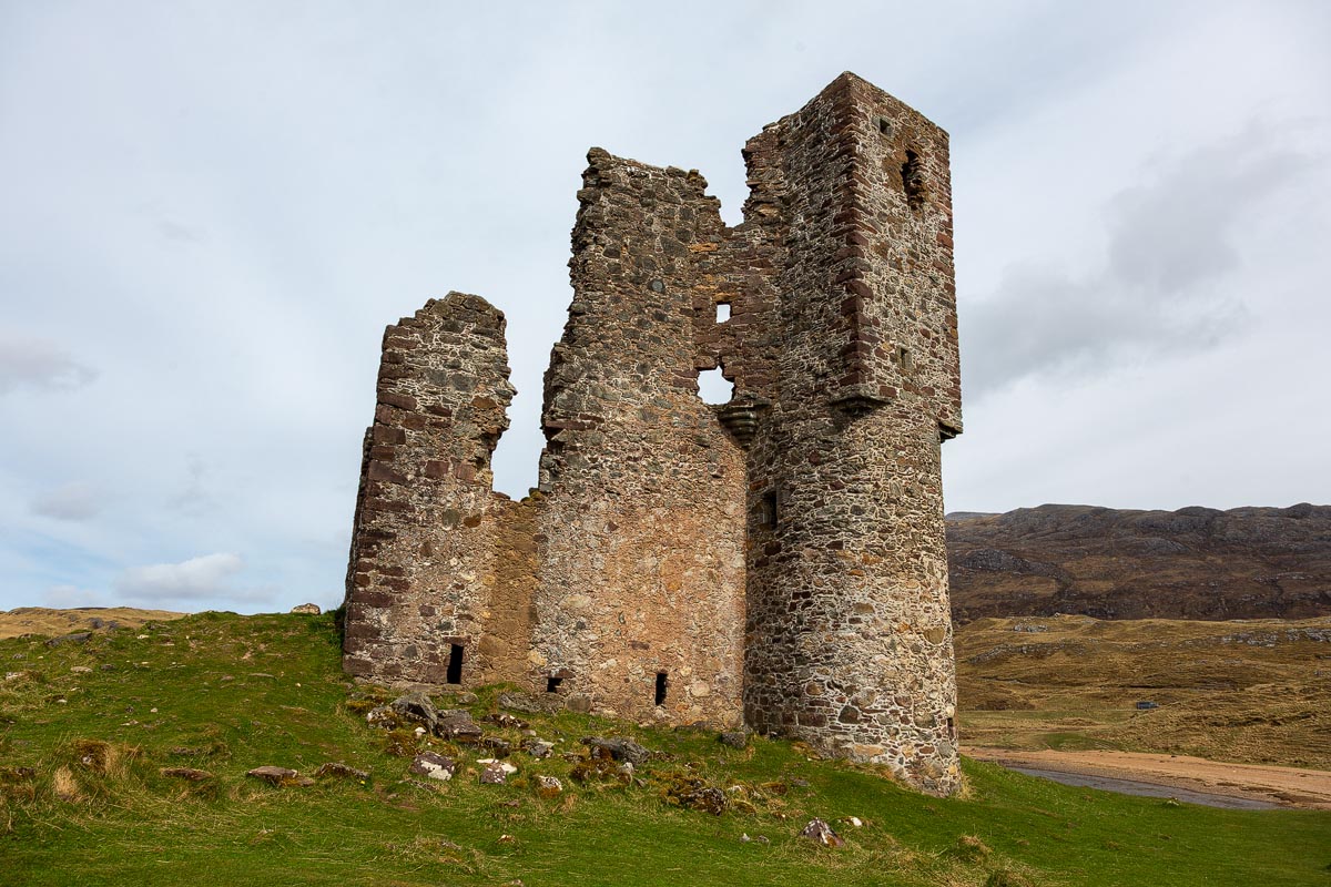 The ruined walls and tower of Ardvreck Castle viewed from the north-east