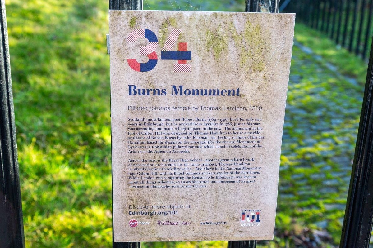 Edinburgh's 101 Objects interpretation panel number 34, describing the Burns Monument as a pillared rotunda temple by Thomas Hamilton