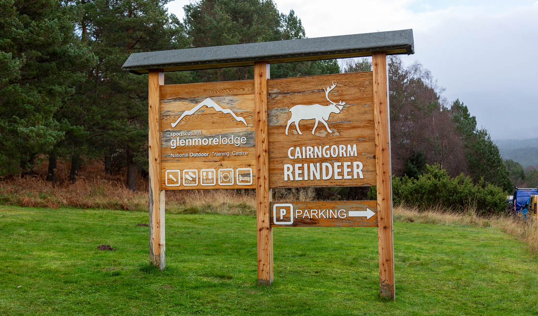Signage for Glenmore Lodge and Cairngorm Reindeer.
