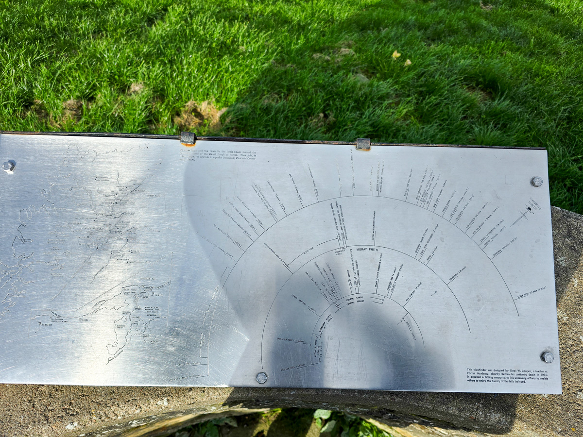 Steel viewfinder plate at Califer Hill Viewpoint showing directions and distances to landmarks