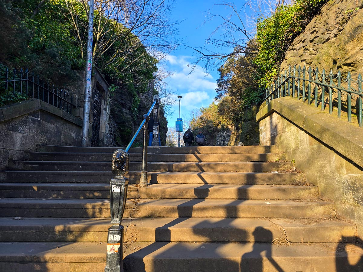 The stone steps leading up to Calton Hill from Regent Road with ornate iron handrails