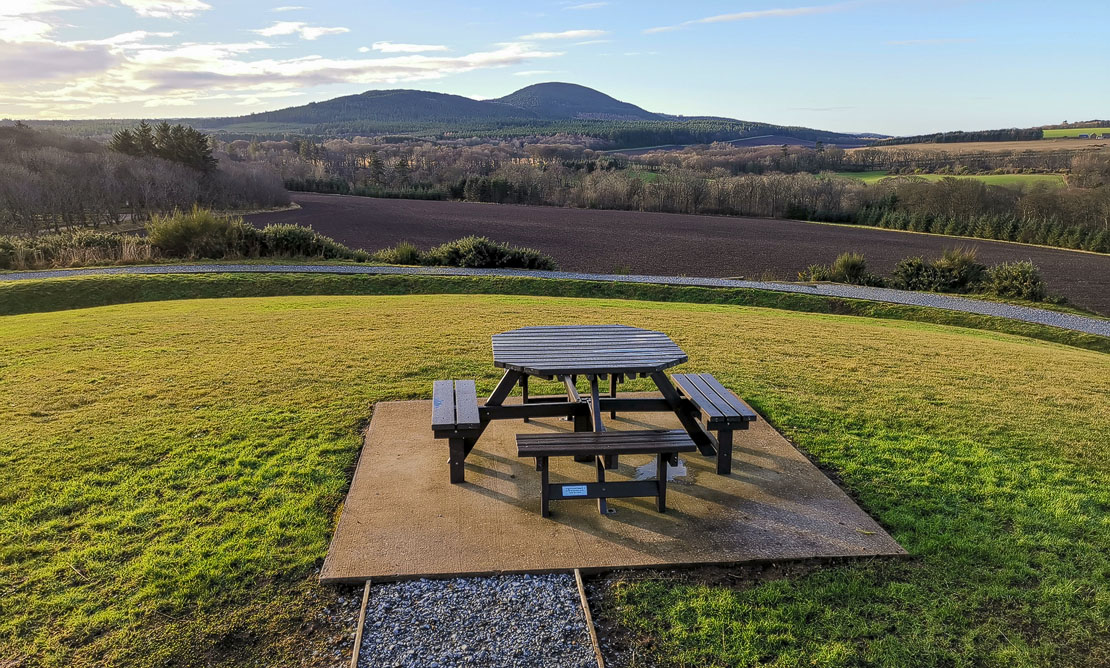 Picnic tables at Castle Hill, Cullen.