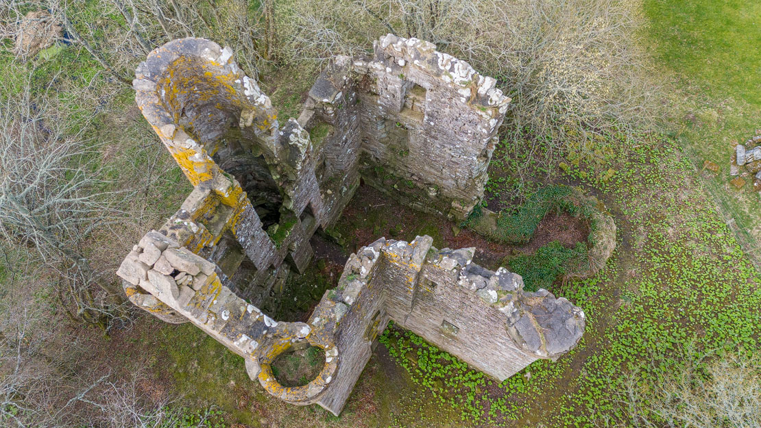 Drone view directly above the castle showing the distinctive Z-plan layout
