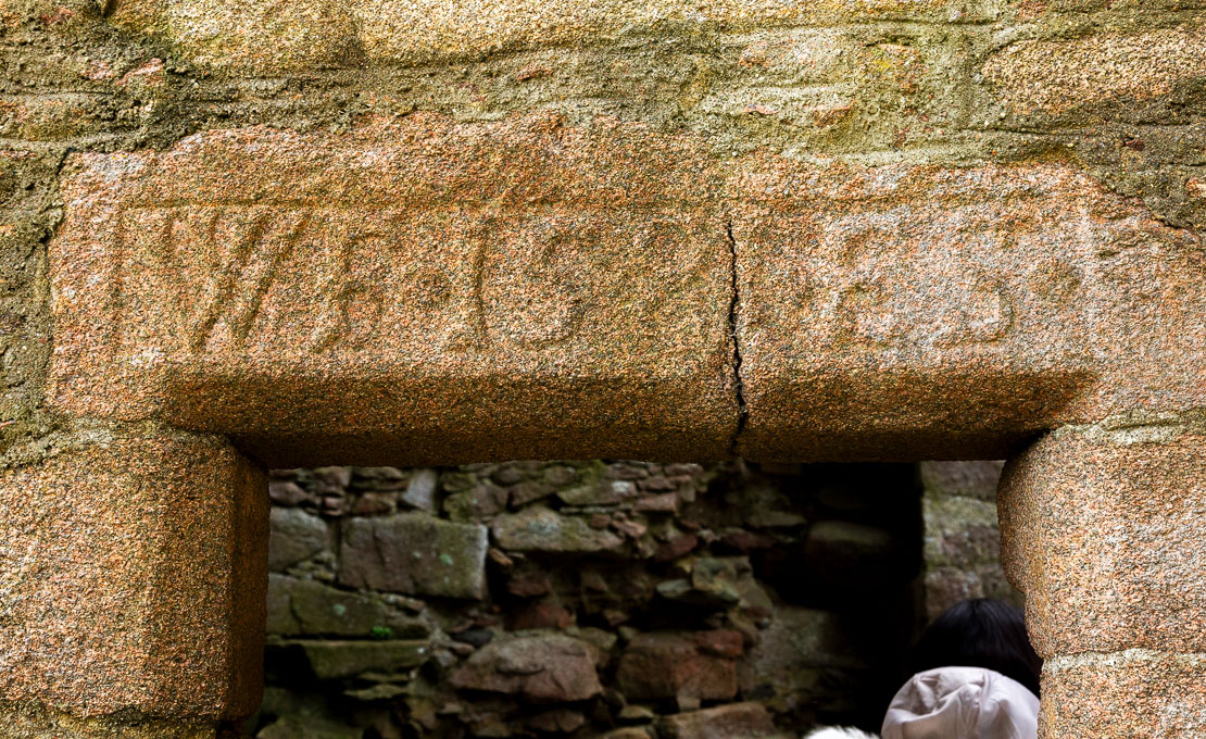 The historic datestone above the entrance bearing William Forbes' initials and the date 1581