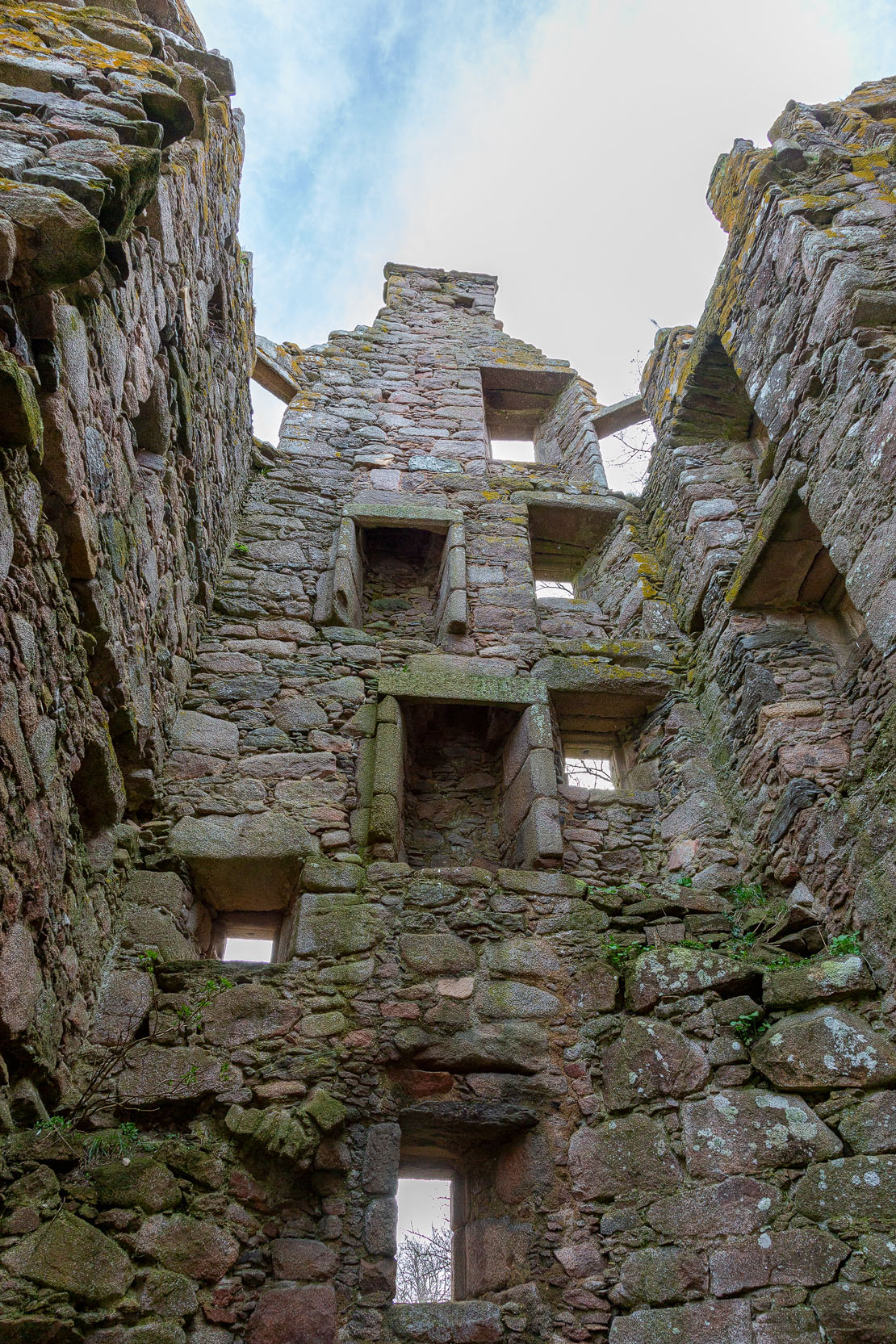 The interior corner showing window openings at different floor levels