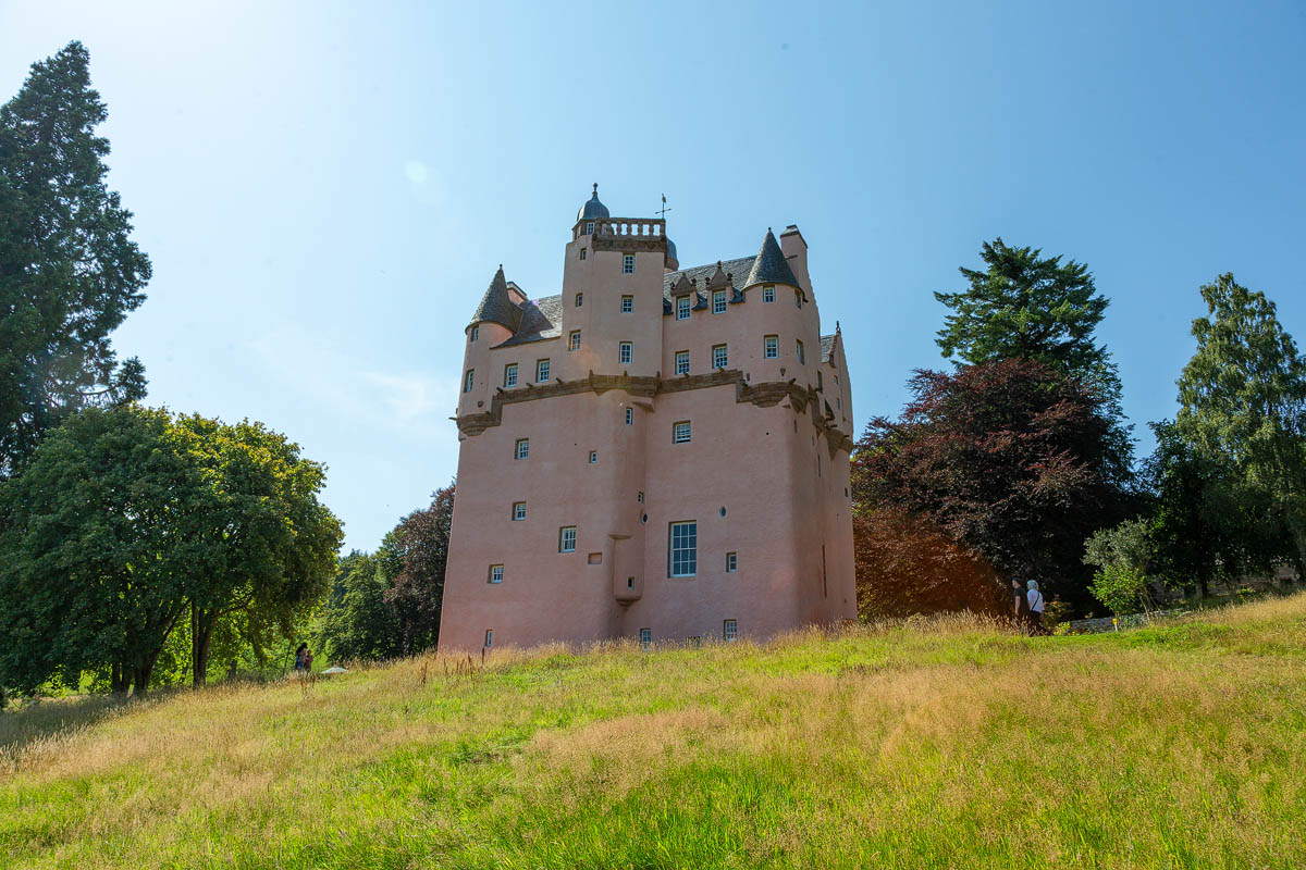 Rear view of Craigievar Castle showing the contrast between plain lower storeys and ornate upper turrets