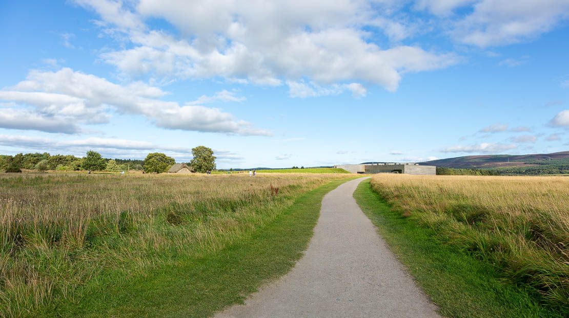 Wide view of Leanach Cottage and Culloden Visitor Centre.