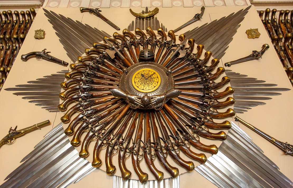 Flintlock pistol clock.