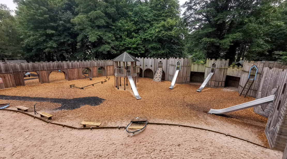 Play fort slides.