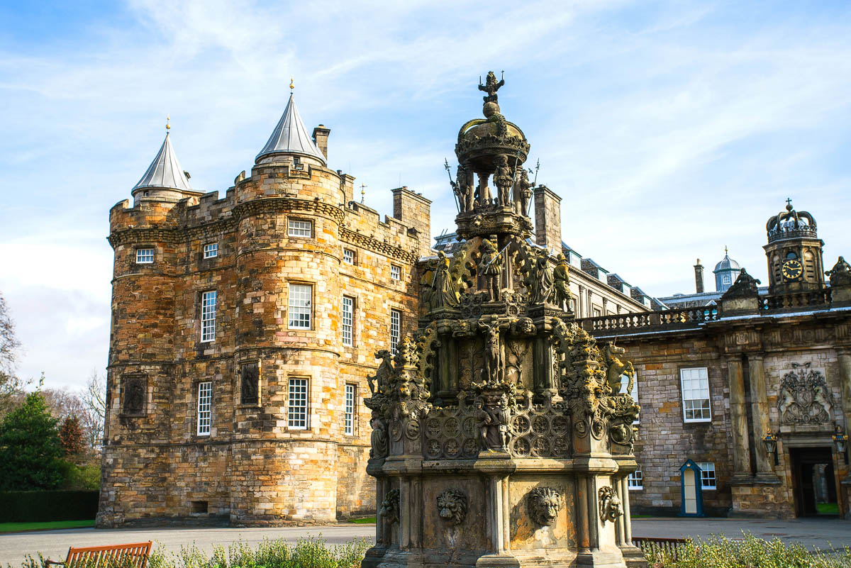 The Palace of Holyroodhouse with the ornate 19th-century forecourt fountain in the foreground