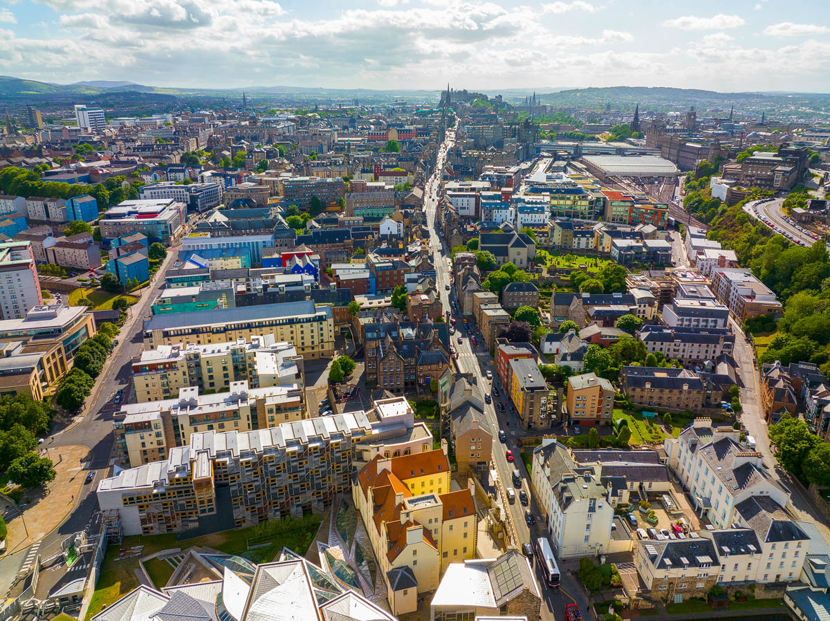 Aerial view of Edinburgh looking west along the Old Town ridge towards the castle with the Pentland Hills in the distance