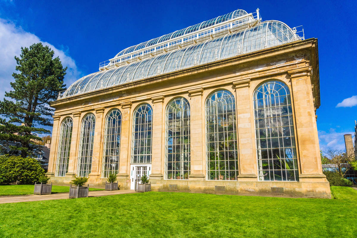The Victorian Temperate Palm House at the Royal Botanic Garden Edinburgh on a sunny day