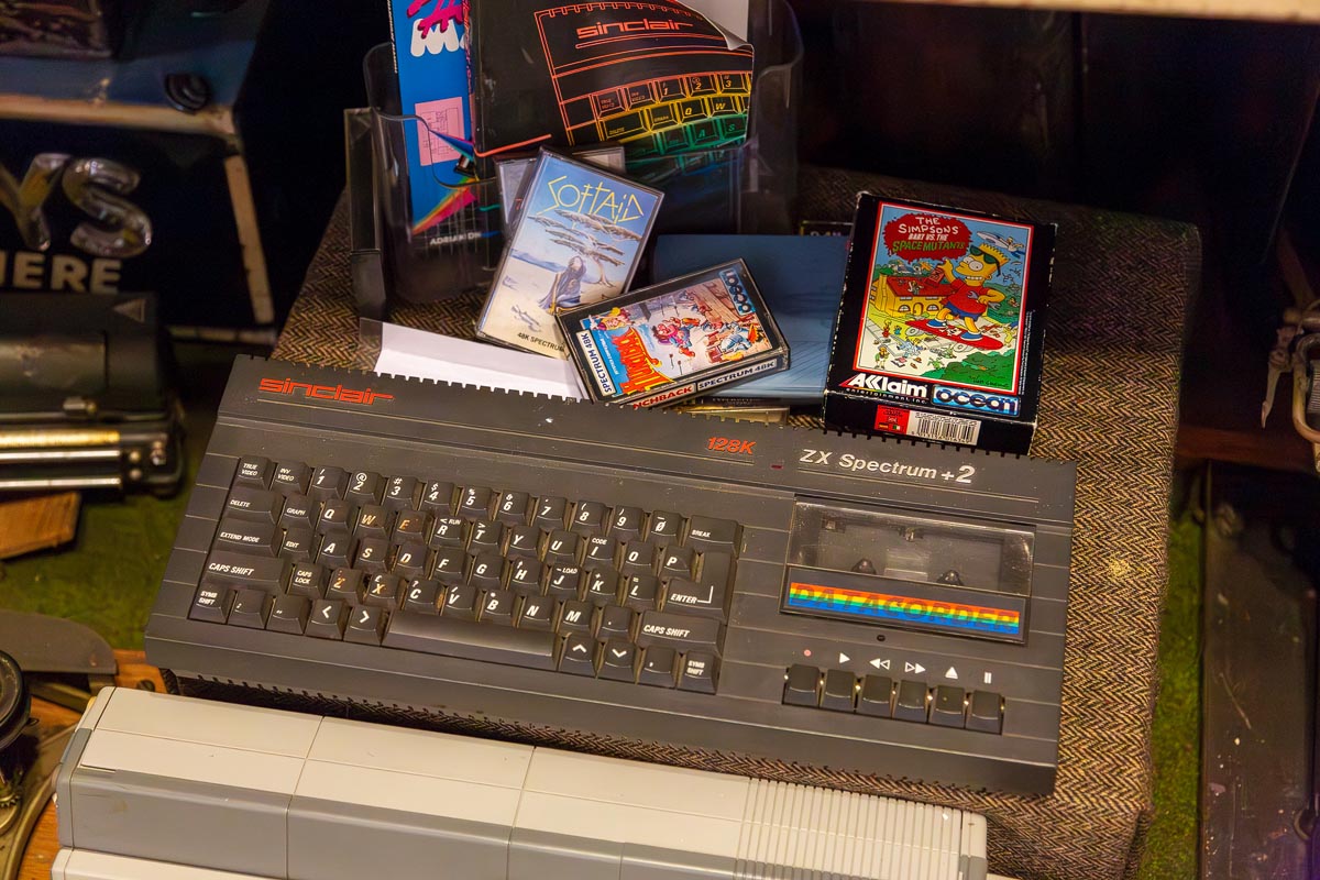 A Sinclair ZX Spectrum Plus 2 computer with game cassettes on display in the museum