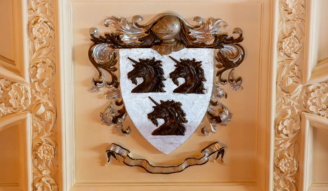 Unicorns on shield.