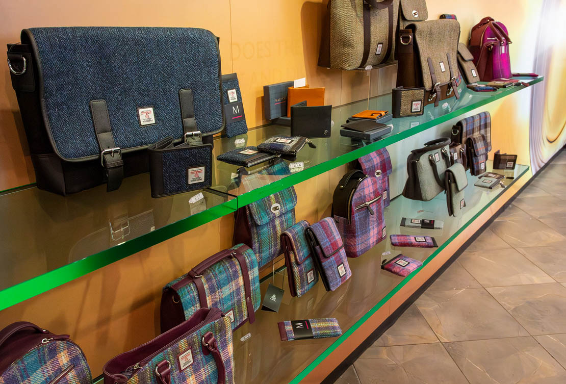 A selection of Harris Tweed backs and wallets.