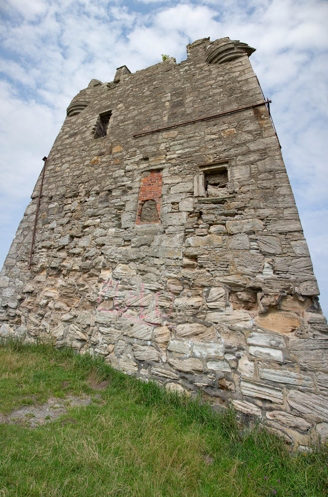 At the foot of Greenan Castle. The mighty stone wall.
