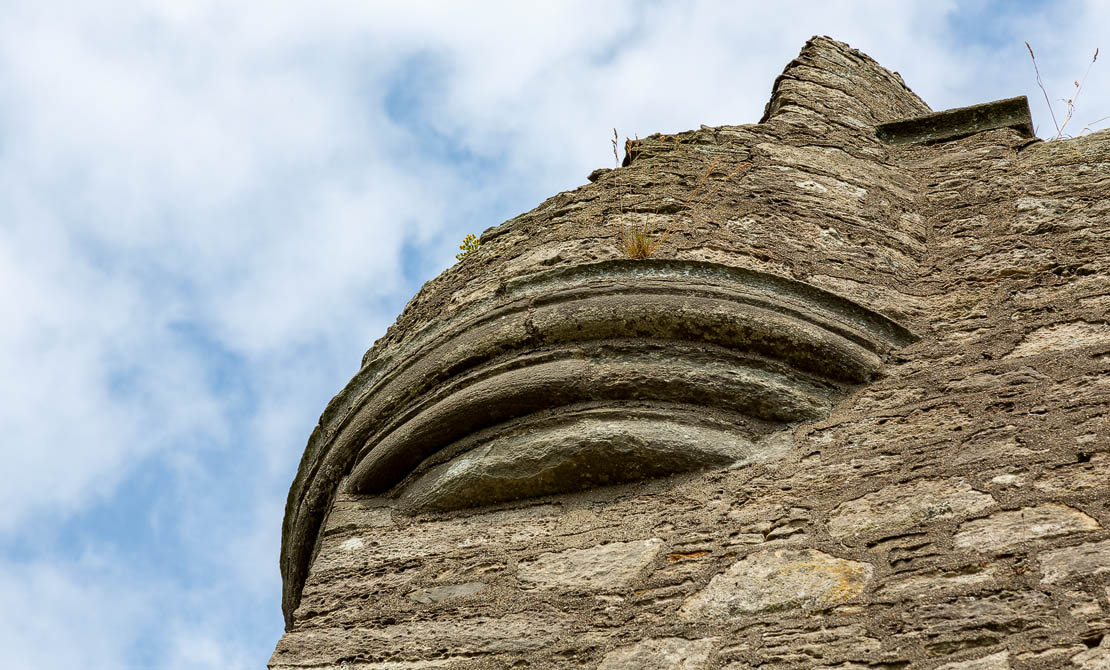 Corbelled towers.