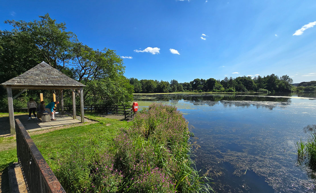 The Lower Lake at Haddo Country Park with a lakeside shelter