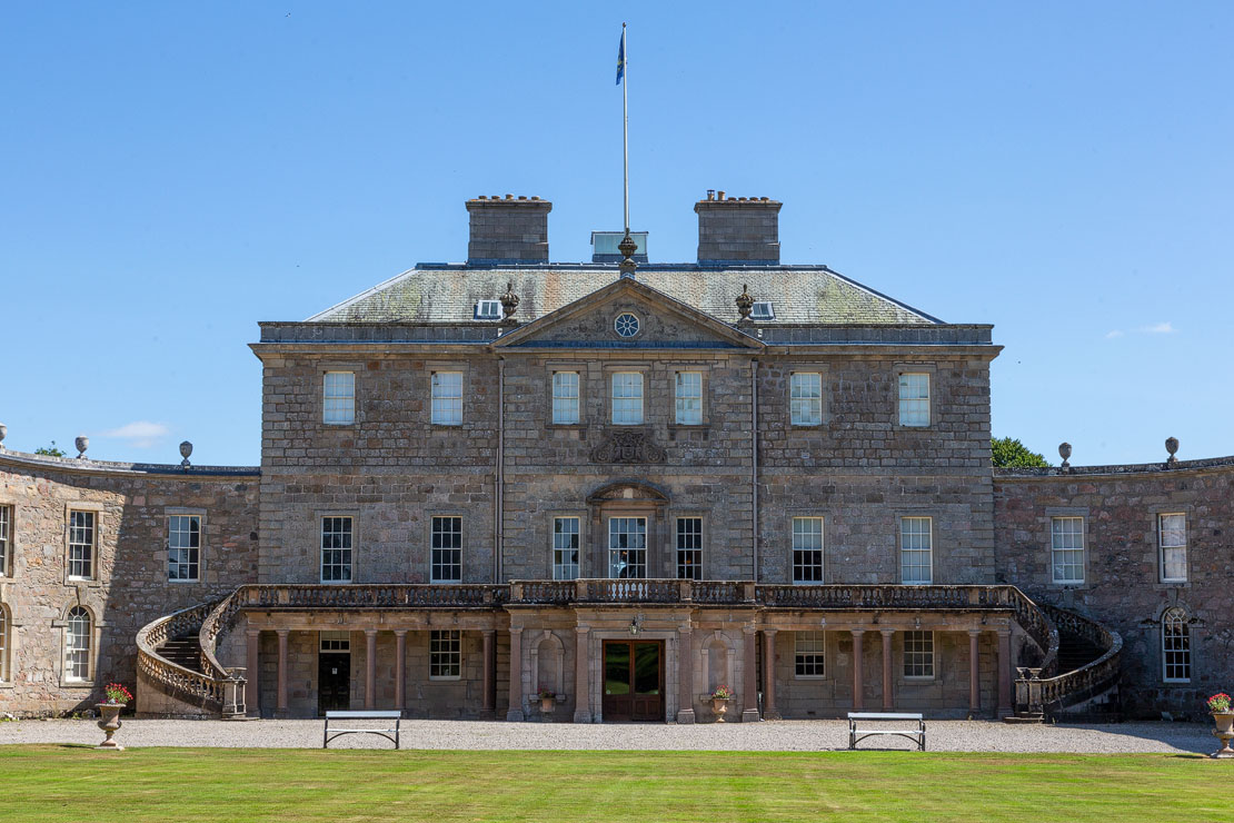 Close-up of Haddo House front entrance with twin sweeping staircases and colonnade
