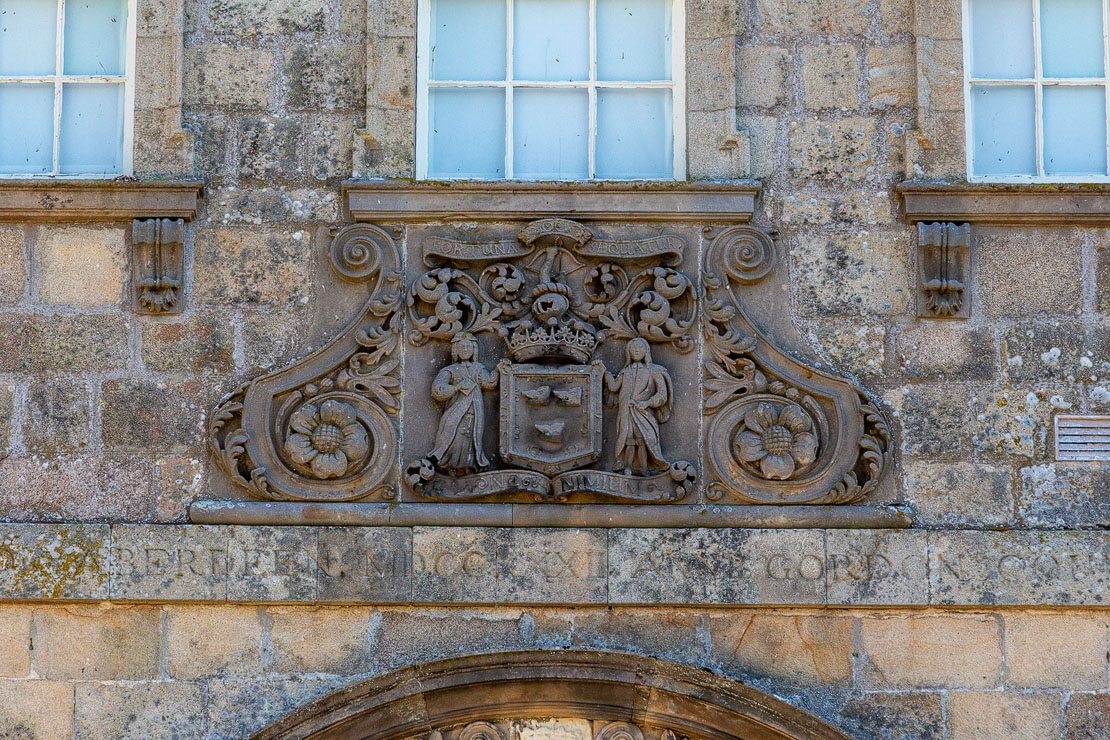 The carved Gordon coat of arms above the entrance to Haddo House