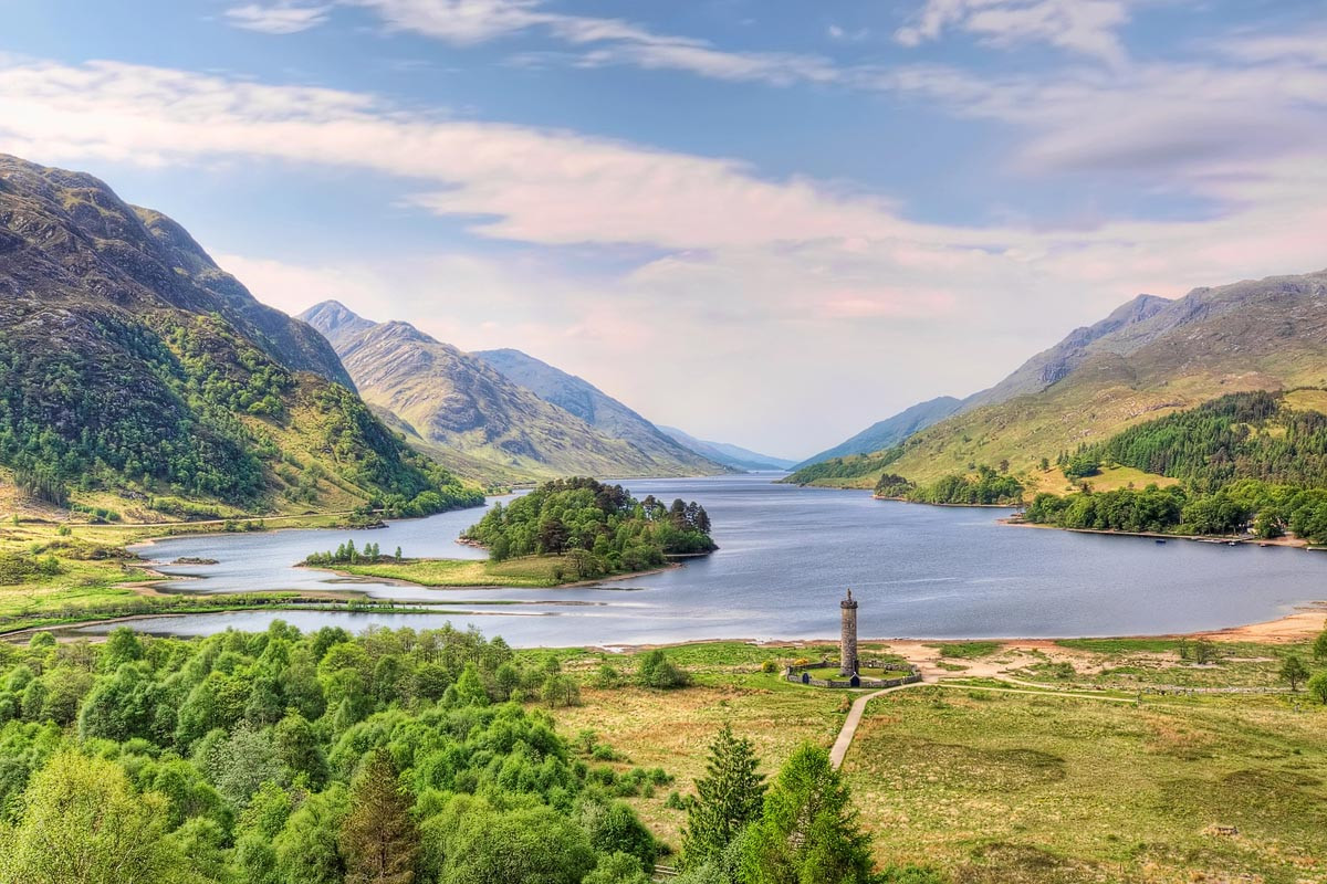 Loch Shiel stretching into the distance with the Glenfinnan Monument in the foreground