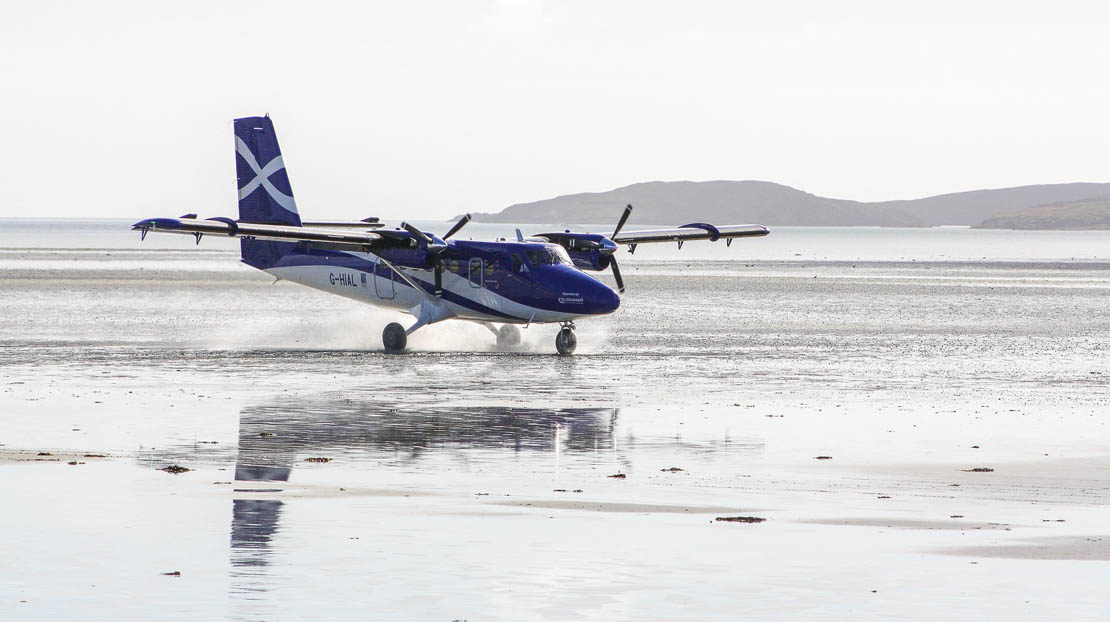 Landing on a wet beach airport. Hebridean sea tours.