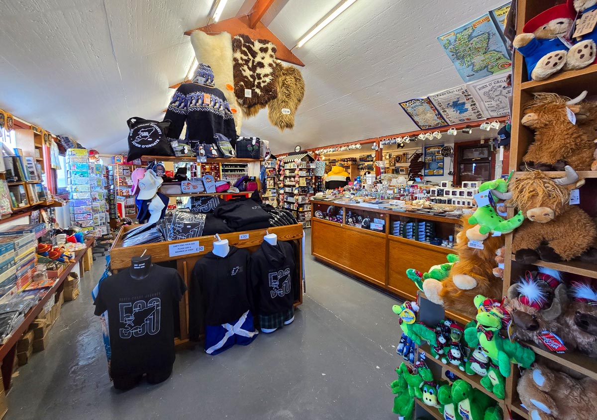 Inside the First and Last souvenir shop packed with Scottish gifts, NC500 merchandise and Highland cow soft toys