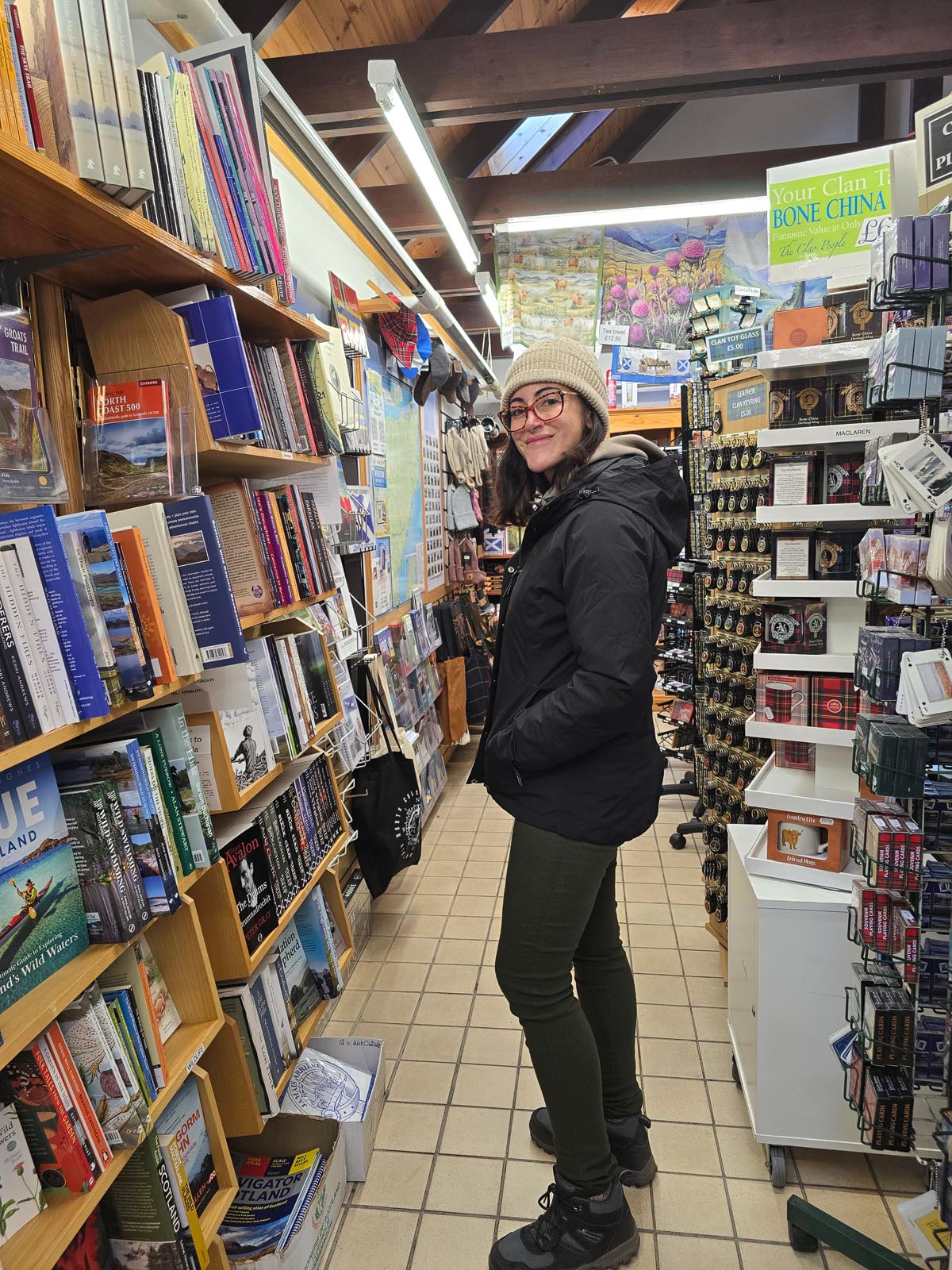 Janette browsing the shelves inside the John o' Groats Bookshop