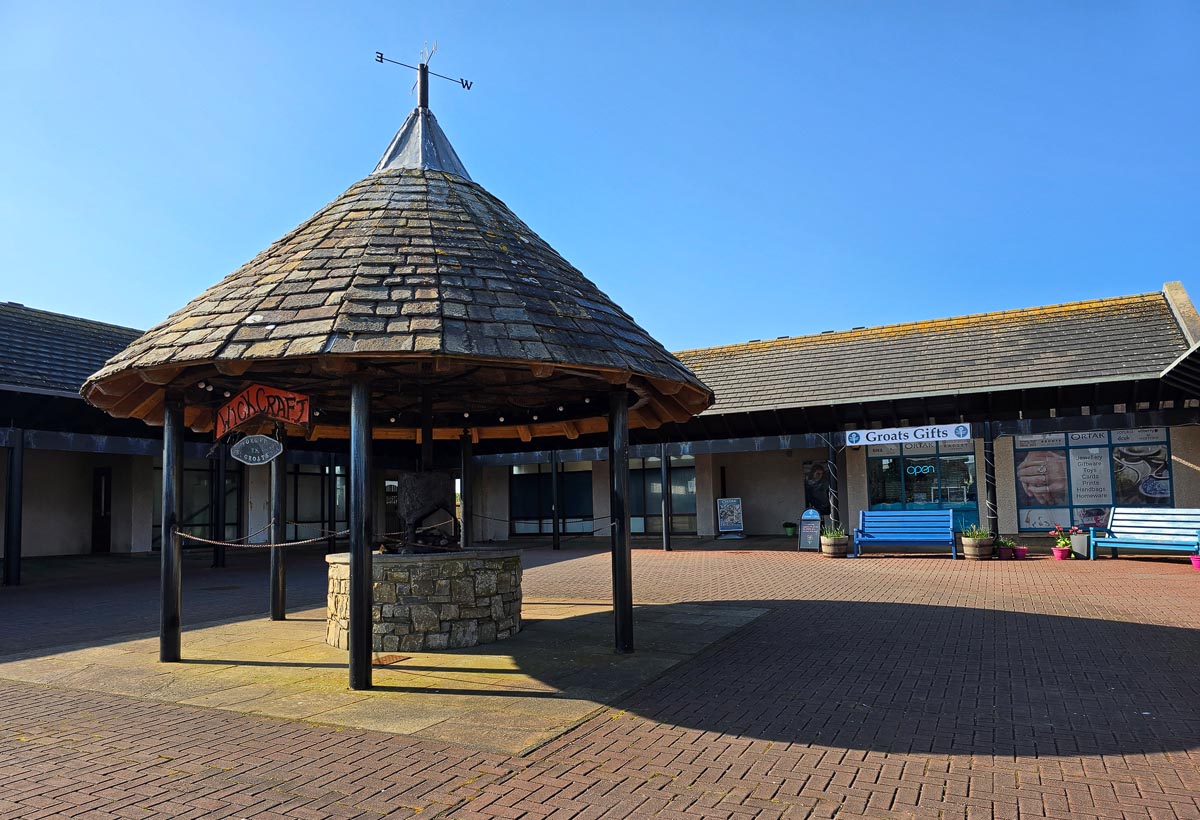 The craft village at John o' Groats with its octagonal-roofed shelter echoing the legend of Jan de Groot's house