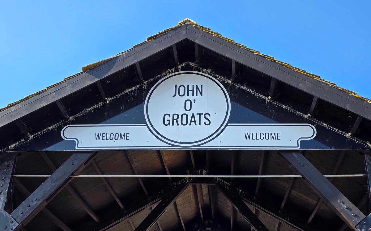 The John o' Groats Welcome sign on the entrance to the craft village