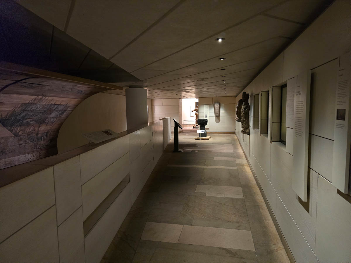 The Early People gallery in the modern wing of the National Museum of Scotland, with carved stones and prehistoric artefacts