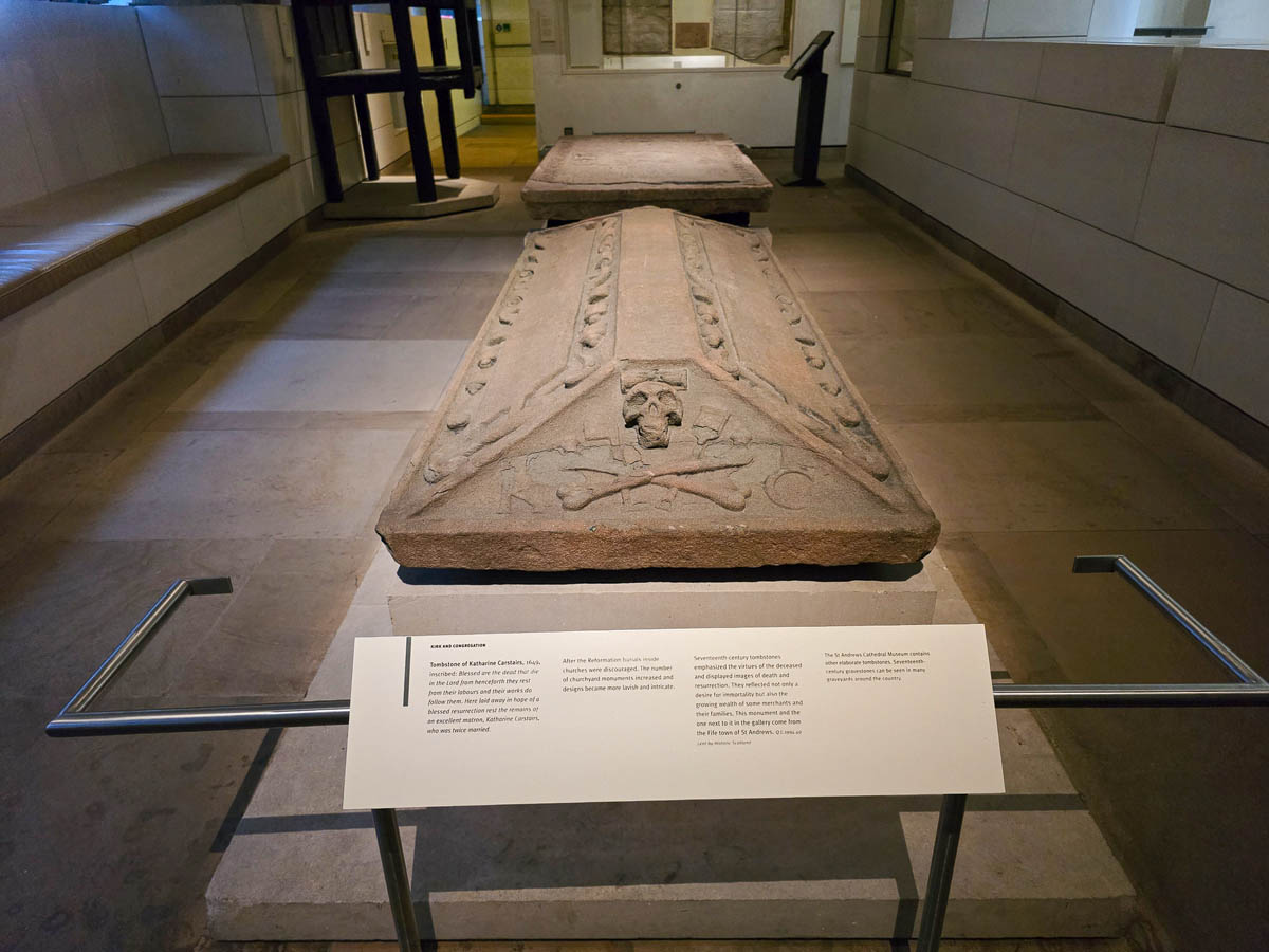 The carved tombstone of Katharine Carstairs from the 1640s showing a skull and crossbones design