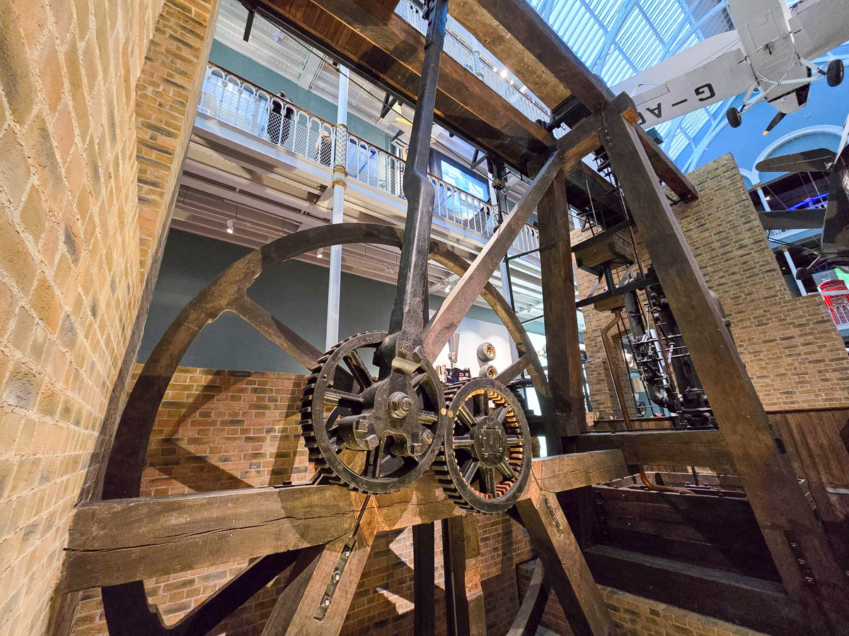 Massive steam engine gears and wooden framework in the Science and Technology gallery
