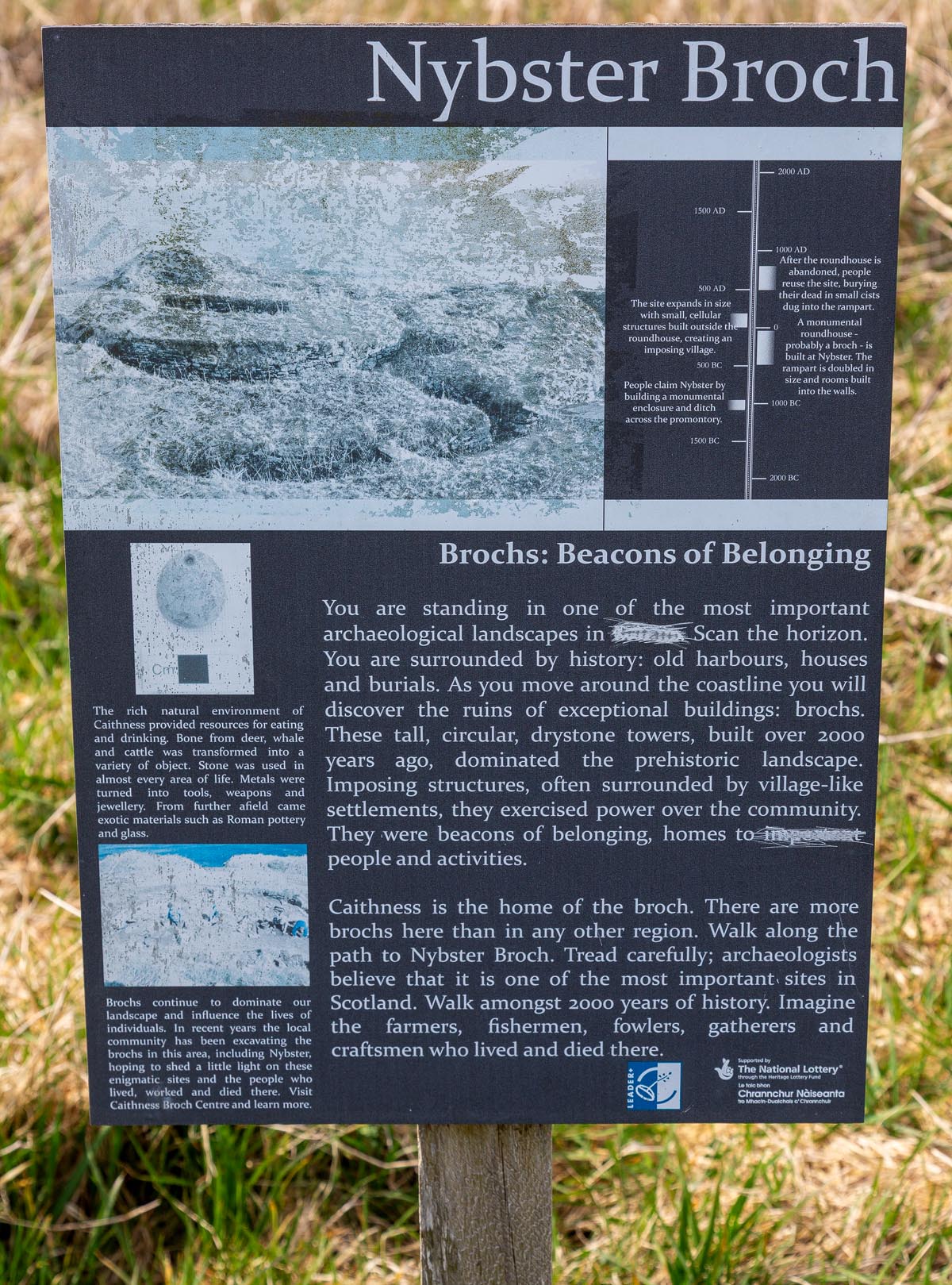 The Nybster Broch interpretation board showing a site timeline and information about brochs as Beacons of Belonging