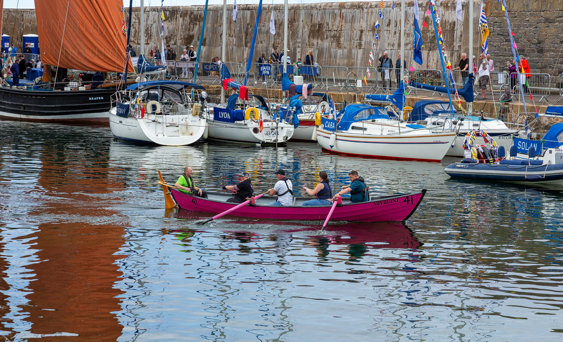 Rowers at Portsoy Harbour