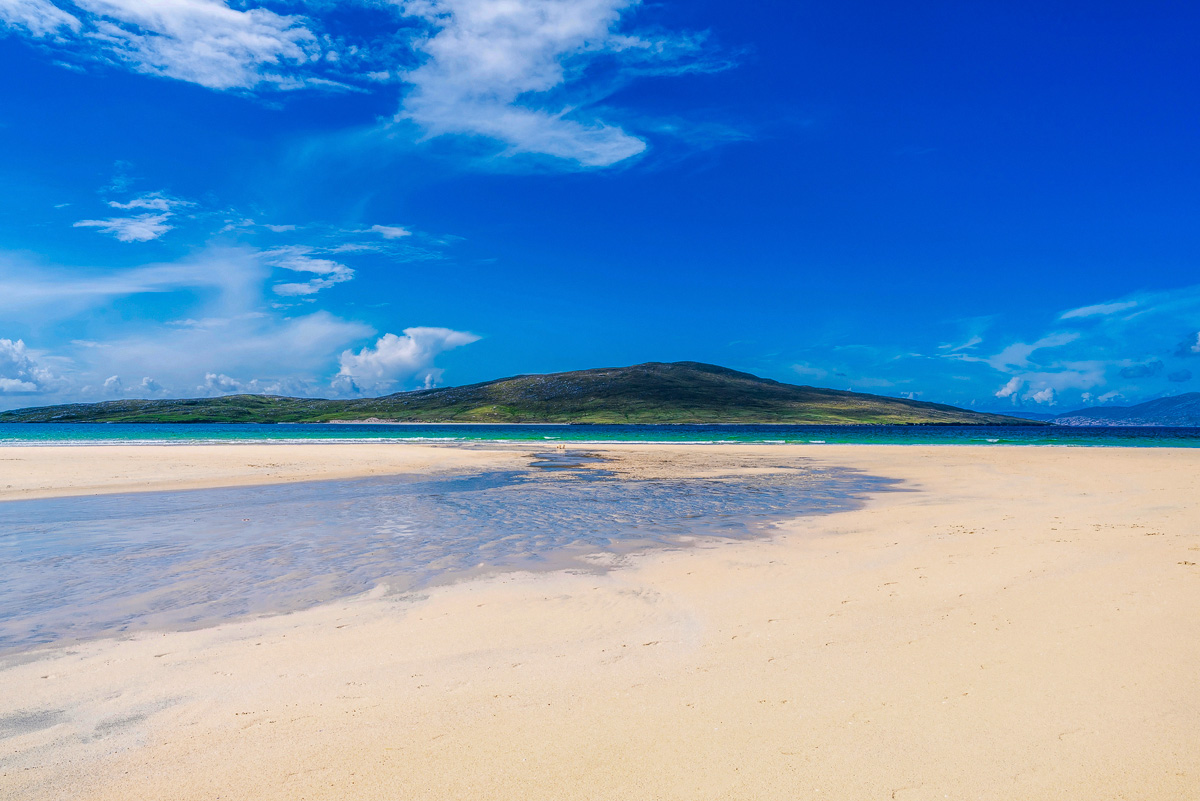 White sand and turquoise water at Luskentyre beach on the Isle of Harris at low tide