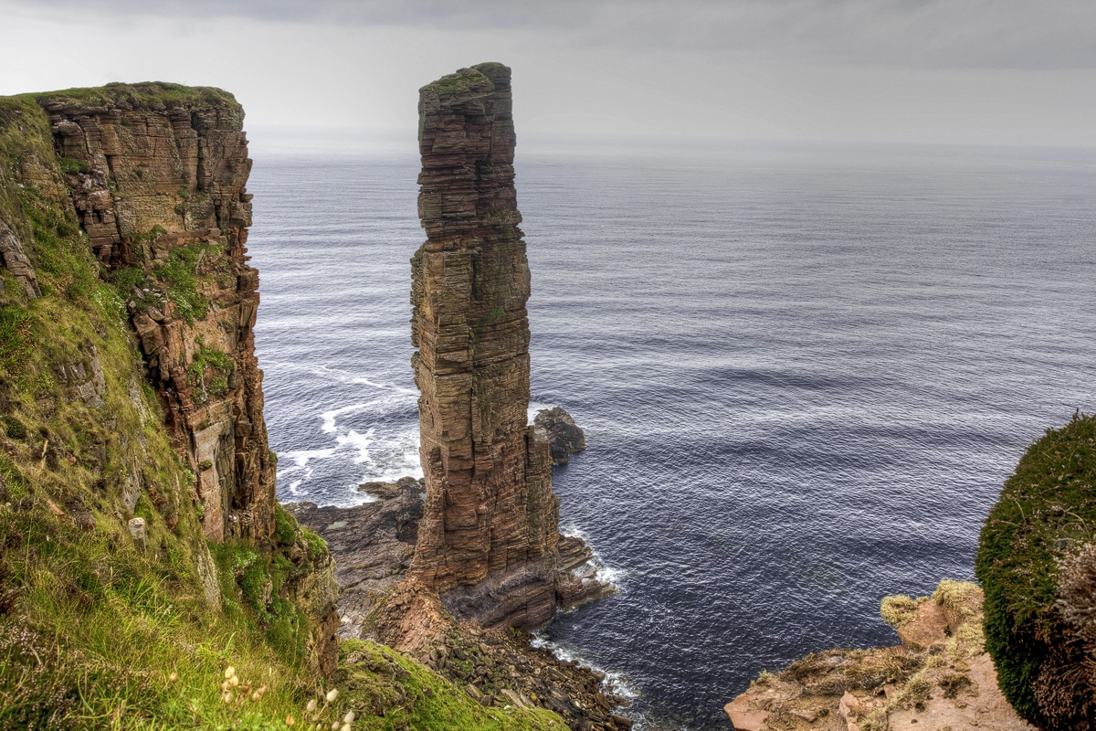 The Old Man of Hoy sandstone sea stack seen from the clifftops on Hoy, Orkney