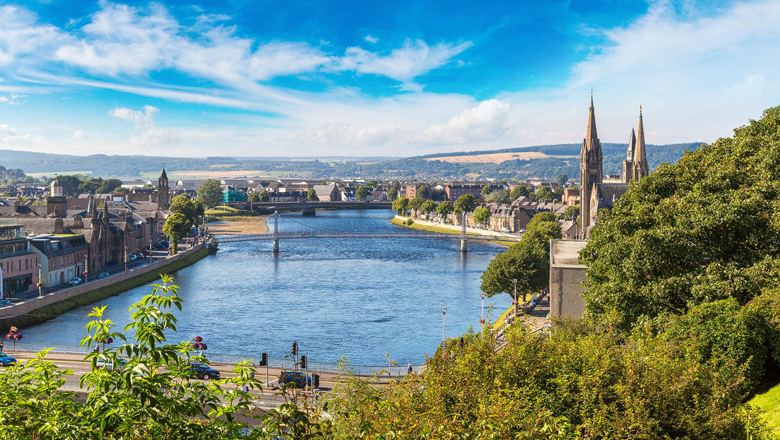 Panoramic view of Inverness from the castle viewpoint with the River Ness flowing through the city centre